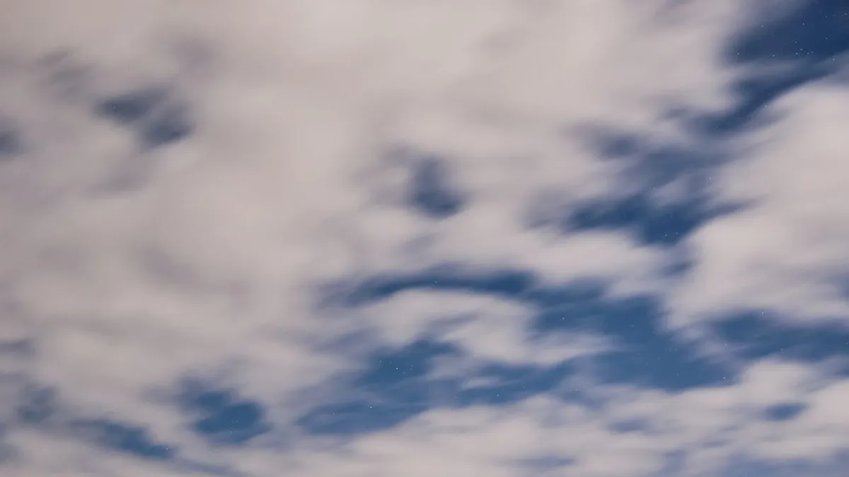 Blurred night sky with clouds over Penrith, England, creating a tranquil atmosphere.