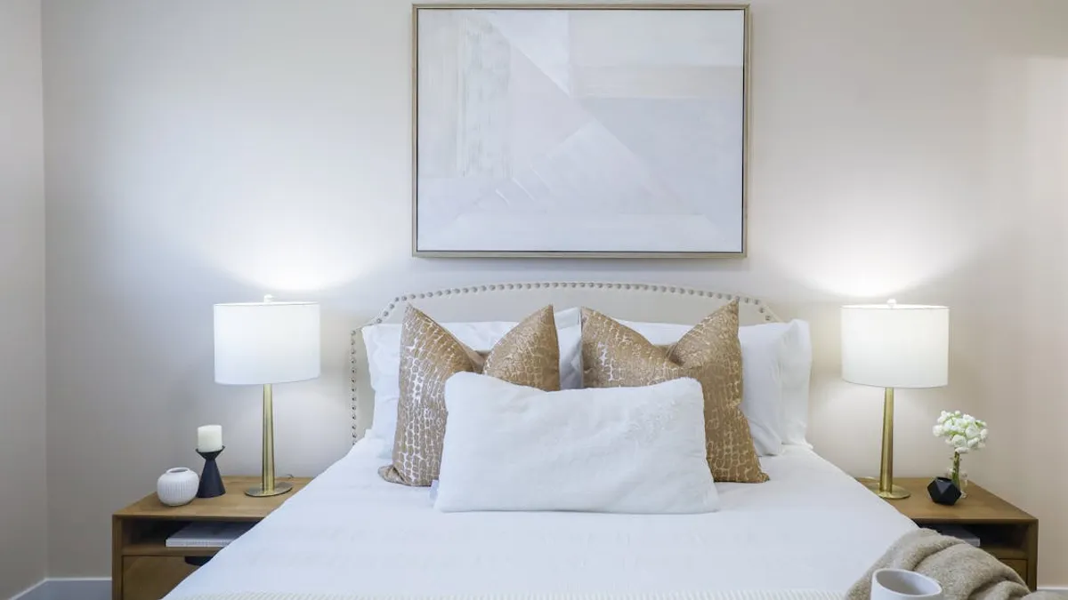 Cozy bedroom interior featuring modern decor and neutral color palette for home staging.